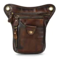 Dettaglio borsa da gamba in vera pelle con finitura marrone vintage e cerniere. - 9471-Marrone caffè brunito