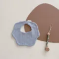 Nordic style petal-shaped baby bib in light blue soft muslin cotton gauze material - Petal Bib / Light Grey Blue