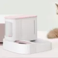 Automatic pet water dispenser and food feeder dual-use bowl in clean white and pink design. - Pink