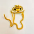 Detailed view of cute Chinese style lion dance cat hat, handmade knitted pet accessory. - One Size / Yellow Lion Dance Hat