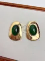 Detail shot of vintage retro style green resin inlay gold metal earrings, elegant texture. - Earrings (EH2025) / Green