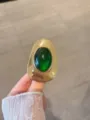 Close-up detail of vintage green stone metal accessory, retro textured surface design. - Ring (JZ0576) / Green