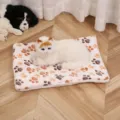 Cozy flannel pet mat close-up showing soft fleece texture and cute paw print design detail. - White Paw