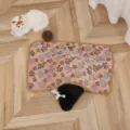 Detailed view of the soft coral fleece pet blanket with cute paw prints for cozy resting. - 40×60cm Blanket / Brown Paws