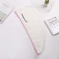 Soft coral fleece dry hair cap in white and pink variant with lovely embroidery design. - 25x65cm / White Heart Style with Pink Border