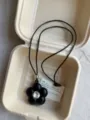 Black five-petal flower pendant necklace with crystal center and adjustable black cord fashion - Black Flower Style (XL1149)