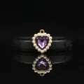 Close-up detail of 18mm heart-shaped pendant with purple crystal and white pearls. - Light Purple