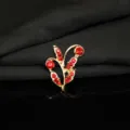Dettaglio accessorio DIY foglia ramo oro strass rosso, ideale per l'artigianato. - Color Diamante Rosso