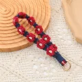 Correa de muñeca llavero tejida a mano con diseño de flores margaritas rojas y azules - Burdeos