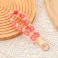 Correa de muñeca hecha a mano con margaritas tejidas en rosa y amarillo y aro - Rojo sandía