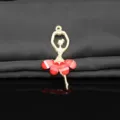 Close-up detail of a gold alloy and red crystal ballet dancer pendant for DIY jewelry crafts. - Bright Red
