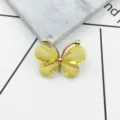 Crystal butterfly alloy accessory detail shot, sparkling yellow DIY phone case decoration. - Yellow