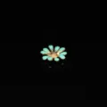 Detailed shot of alloy enamel daisy charm, perfect for DIY phone case and hair accessories. - Teal
