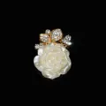 Detailed close-up of a delicate white carved rose alloy accessory adorned with sparkling rhinestones. - KC Gold