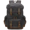 Vintage dark grey canvas backpack with brown leather straps and retro multi-pocket design. - Gray