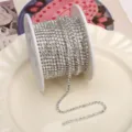 Silver rhinestone close claw chain trim for DIY crafts, phone case decoration and nail art 1 roll - White Rhinestone (SS6.5) / 2mm (1m Pack) / Silver Base