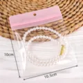 Bolsas de almacenamiento transparentes para joyas con cierre, embalaje de plástico para pulseras. - 10 unidades/Paquete / Rosa (#06)