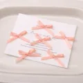 Mini fiocchi in nastro rosa per accessori capelli fai da te decorazione, piccoli fiocchi a mano. - 10 Pezzi/Confezione (Circa 2.5x2cm) / Rosa pesca