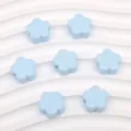 Cuentas acrílicas azul claro en forma de flor de cinco pétalos piezas para joyería DIY - Azul