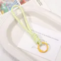 Minimalistische gevlochten sleutelhanger lanyard DIY accessoire handgemaakte touw tas bedel. - 1 Stuk / Geel