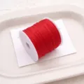 Vibrant red jade cord spool for DIY handmade braided bracelets, necklaces, and jewelry making. - Red