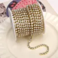 Gold rhinestone chain roll for DIY crafts, phone cases, and nail art decoration accessories. - White Rhinestone (SS16) / 3.4mm (1 Meter Pack) / Gold Base