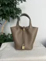 Classic top layer cowhide bucket handbag with metal lock detail for daily women fashion style - Gold Buckle / Elephant Gray