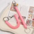 Pink spring coil lanyard keychain, cute anti-lost phone charm school bag pendant. - Pink