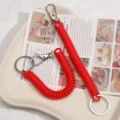 Porte-clés ressort rouge lanière mignon pendentif sac à dos chaîne de téléphone - Rouge