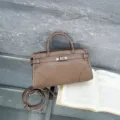 Classic brown leather top handle shoulder bag with metal lock detail for daily women fashion. - Khaki