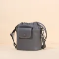 Stylish grey leather drawstring bucket bag, versatile cross-body shoulder bag for daily commuting. - Gray