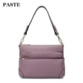 Mauve leather multi-zipper shoulder crossbody bag for women, stylish daily handbag. - Taro