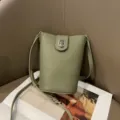 Green genuine leather crossbody phone bag for women, stylish small bucket bag with metal lock. - Matcha Green
