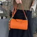 Stylish genuine leather cylindrical shoulder bag for women, orange barrel crossbody bag. - Orange