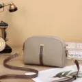 Women's casual dome crossbody bag, genuine leather retro shoulder bag with elegant metal hardware. - Khaki