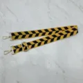 Durable wide canvas replacement shoulder strap with yellow and black chevron pattern. - Style 1