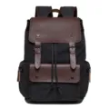 Vintage canvas backpack with brown leather flap, large capacity travel school bag for daily use. - Black
