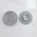 Grey silicone makeup brush cleaning mat, durable multi-texture cosmetic brush cleaner tool. - Gray