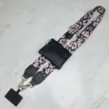 Adjustable wide replacement shoulder strap with coin pouch and phone tether in pink leopard. - Pink Leopard