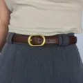 Women retro brown leather belt with gold oval buckle fashion waist accessory main view - Brown
