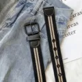 Ceinture en toile style coréen à rayures mode, accessoire idéal pour jean au quotidien. - Noir