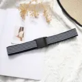 Elastic belt with black and white stripes and plastic buckle, perfect for casual jeans and daily wear. - Blue & White