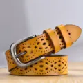 Gelber Damen Ledergürtel mit Blumen LochMuster und Metall DornSchSchnalle für Mode Stile. - 105cm / Hohl Orange