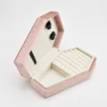 Pink velvet coffin jewelry box with ring rolls and storage compartments for gothic decor items. - Pink