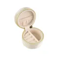 Mini ronde fluwelen sieradendoos in beige, draagbaar reisetui voor ringen met ritssluiting. - Lichtbeige