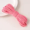 Pink core-spun cotton braided rope for handmade DIY crafts, sewing, and apparel accessories. - Sunset Pink