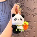 Cute plush panda keychain with an orange pendant, soft fluffy bag hanging accessory gift. - OPP Bag / Plush Fruit Backpack Panda - Orange Edition