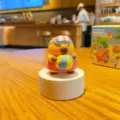 Cute capybara resin figurine with island vacation theme, beach ball and goggles, desktop decor - Water Polo Capybara
