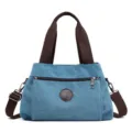 Borsa a tracolla casual da donna in tela, borsa a mano monocolore versatile con manici. - Blu