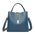 Blue PU leather shoulder bag for women, stylish top handle handbag with gold hardware. - Blue